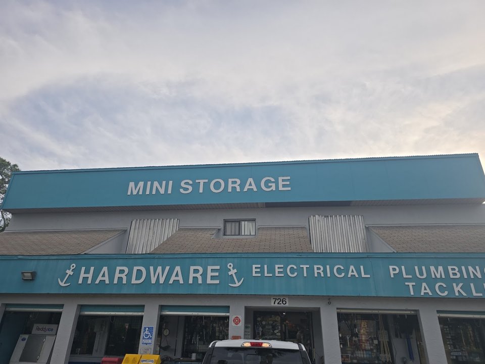 Hardware aisles with fishing tackle and bait supplies.