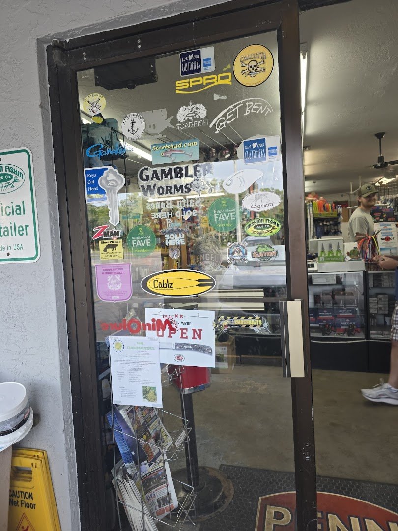 Store shelves packed with tools and boating gear.
