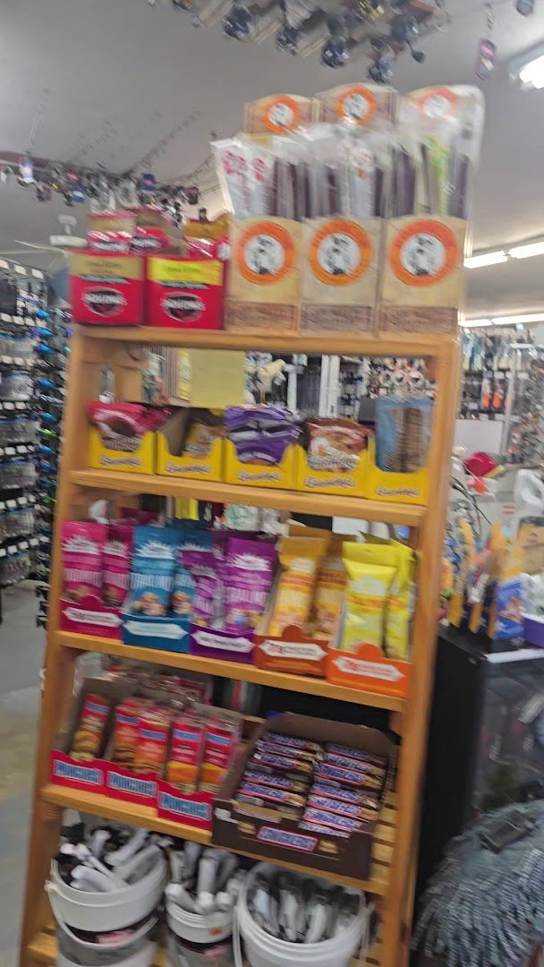 Old-fashioned shop interior with hardware and bait displays.