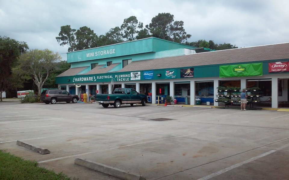 Retail counters lined with local hardware store goods.